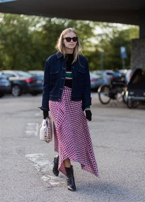 Wear A Long Blanket Skirt With A Denim Jacket And Shiny Leather Boots