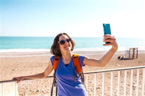A Girl Takes A Selfie On The Beach Stock Image Image Of Smiling City 141615283