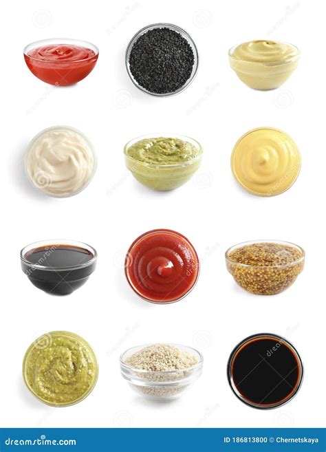 Set Of Different Delicious Sauces And Condiments On Background Stock