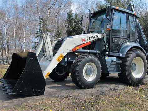 Экскаватор погрузчик Terex Tx 870b аренда строительной техники в Санкт