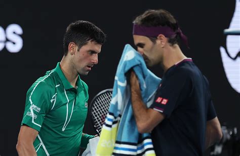 Djokovic defeated raonic in three sets. Roger Federer, Novak Djokovic - Novak Djokovic Photos ...
