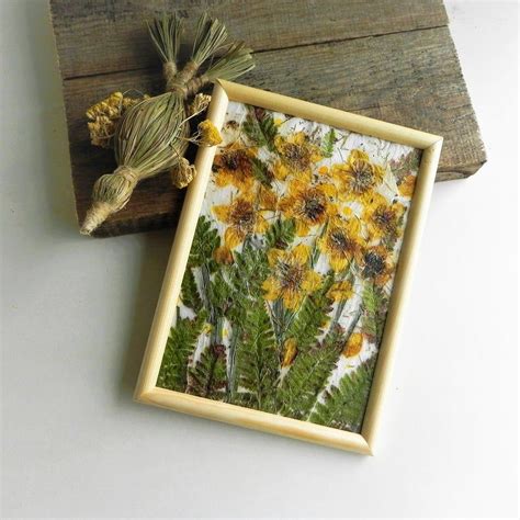 Bees can collect pollen from a flower and transfer it to their bee hive to turn it into a collectible honeycomb. Real dried yellow flower art framed gift | Etsy in 2020 ...