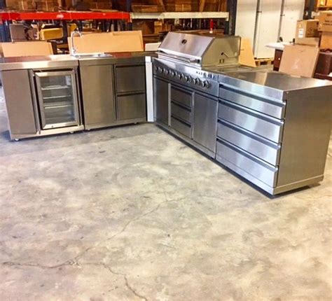 It adds the preparation space and storage you need to make cooking as smooth a process as it is inside. Stainless Steel outdoor kitchen system by Marrinox ...