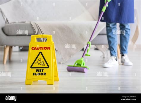 Janitor Mopping Floor In Room Stock Photo Alamy