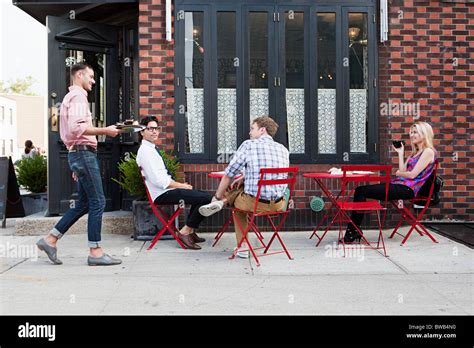 People Sitting Outside Cafe High Resolution Stock Photography And