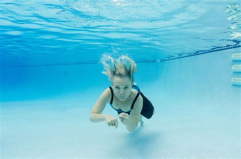 Underwater Swimming Of Retired Woman Underwater Swimming Exercise Swimming