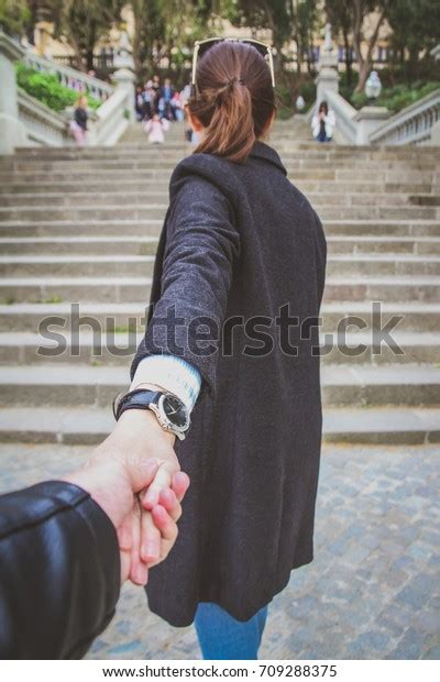Couple Holding Hand Girl Walking Ahead Stock Photo 709288375 Shutterstock