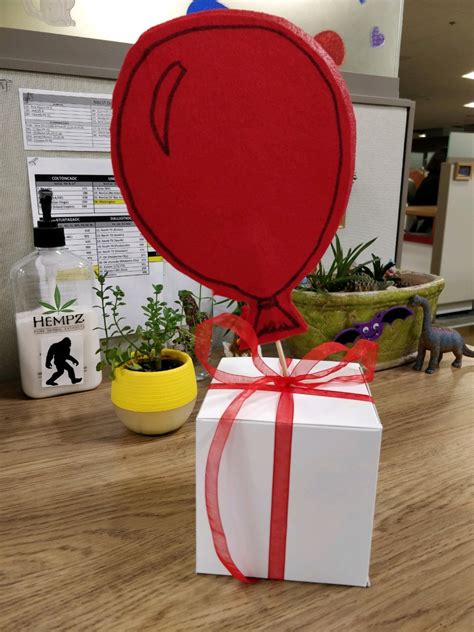 They appear as a white present tied with a red bow, hanging from a balloon. My friend made me an Animal Crossing balloon present for ...