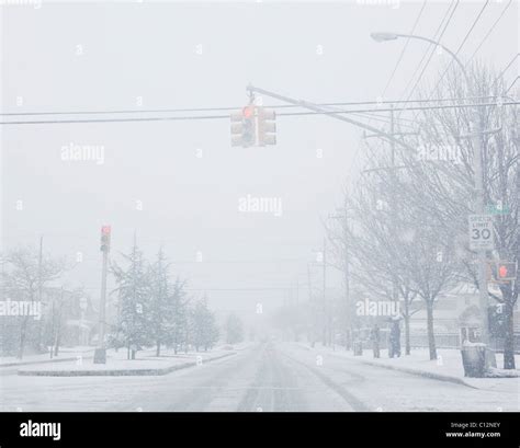 Usa New York State Rockaway Beach Street During Blizzard Stock Photo