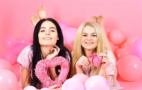 Girls Lay Near Balloons Holds Heart Toys Pink Background Sisters