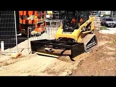R&D paving grading with Bobcat A770 and grader attachment ...