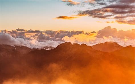 Orange Clouds Over Mounta Macbook Air Wallpaper Download