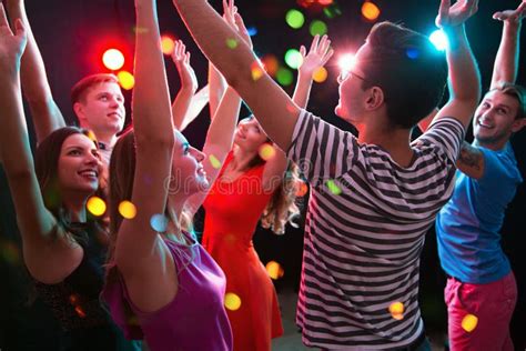 Group Of Young People Having Fun Dancing At Party Stock Photo Image