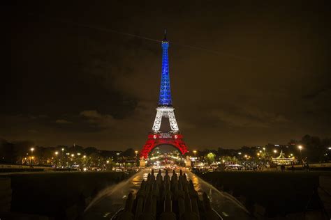 Photos Eiffel Tower In The French Flags Colors Chicago Tribune