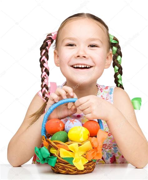 Little Girl With Basket Full Of Colorful Eggs Stock Photo By ©kobyakov