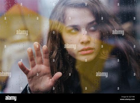 Woman Looking Through Window Rain Hi Res Stock Photography And Images