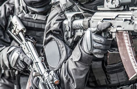 Swat Team Members Armed With Service Photograph By Oleg Zabielin Fine