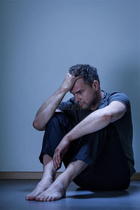 Depressed Man Sitting On The Floor Stock Image Image Of Despair