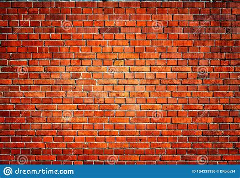 Red Brick Wall Background With Spotlight Light In The