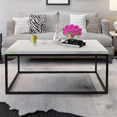 A spacious living room featuring one small, sleek end table to the right of the beige, nailhead trimmed sofa. Gymax Modern Rectangular Cocktail Coffee Table Metal Frame ...
