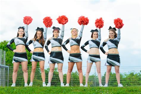 Cheerleaders Rooting For Their Team Stock Photo Download Image Now