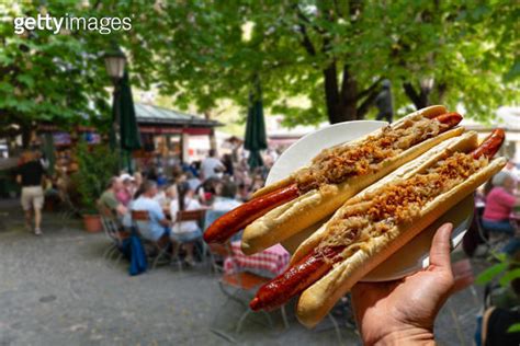 German Bavarian Hot Dog In Viktualienmarkt Munich With Sauerkraut