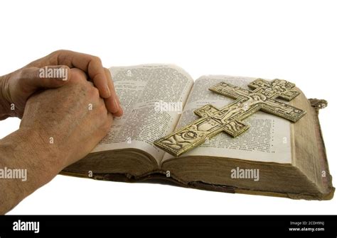 Praying Hands On Open Bible Hi Res Stock Photography And Images Alamy