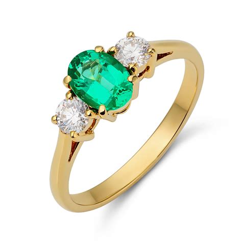 18ct Yellow Gold Oval Emerald And Diamond Ring Pravins