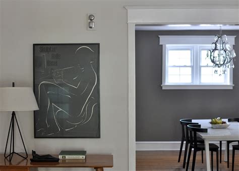 •buy gray paint samples and paint large swatches on walls in different lighting conditions. Benjamin Moore Pale Oak on the left, Restoration Slate on ...