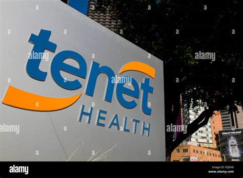A Logo Sign Outside Of The Headquarters Of The Tenet Healthcare