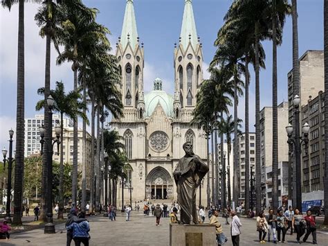 View To Front Of Catedral Da Se Through Palm Alley In Downtown Sao