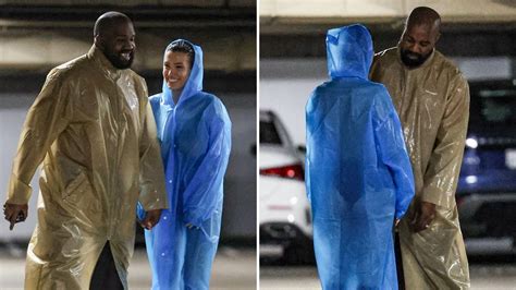 kanye west and bianca censori topless under see through raincoats