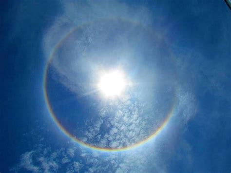 See what causes a sun halo, the shapes that sun halos take on, and what a sun halo really sun halos are generally considered rare and are formed by hexagonal ice crystals refracting light in the. Sun halo | Weather underground, Nature, Lightning cloud