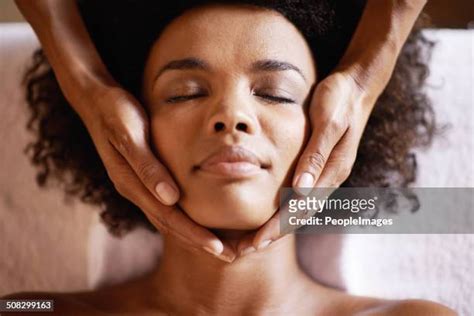 Black Woman Massaging Face Photos And Premium High Res Pictures Getty Images