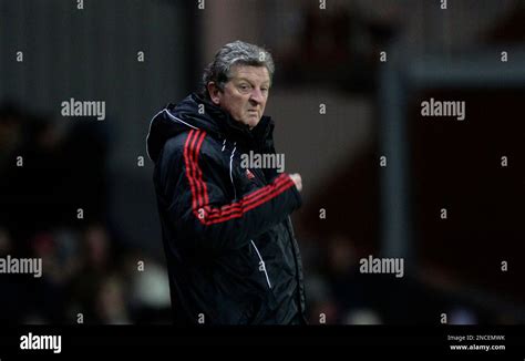 Liverpools Manager Roy Hodgson Stands On The Touchline During His Team