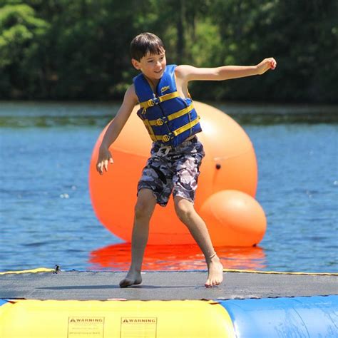 Boy On Inflatable Ymca Of The Pines
