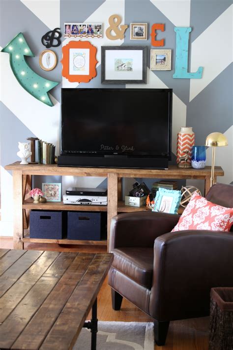 Maybe you would like to learn more about one of these? PitterAndGlink: Creating a Fun & Eclectic TV Gallery Wall