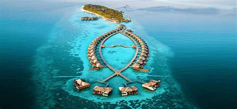 Lily Beach Resort And Spa At Huvahendhoo Luxury Maldives Honeymoon Packages Honeymoon Dreams