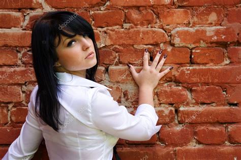 Woman Near The Brick Wall — Stock Photo © Midnight13 1027349