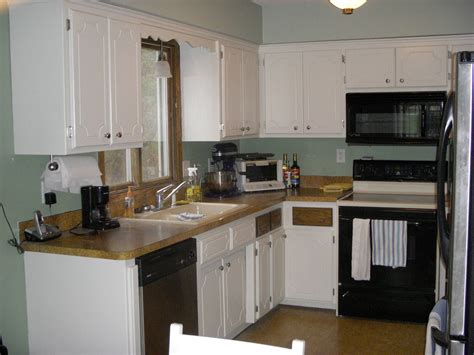 My home's paint colors (room by room!) | driven by decor. dove wing benjamin moore - Google Search | Kitchen cabinet ...