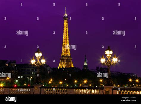 Night Illumination On The Bridge Of Alexander Iii And Eiffel Tower In