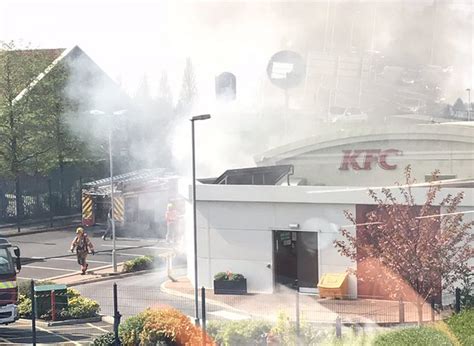 KFC Restaurant In Flames After Burning Car Rolls Up To Order Window BT