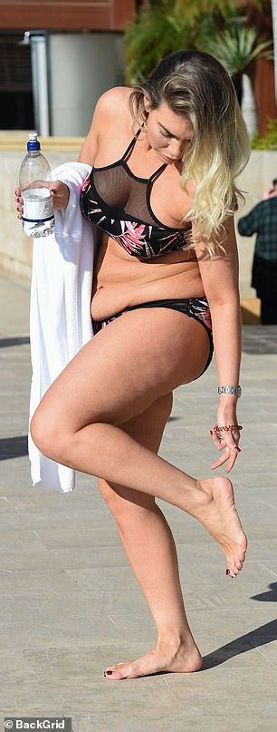 Frankie Essex Flaunts Her Curves In A Skimpy Floral Bikini As She