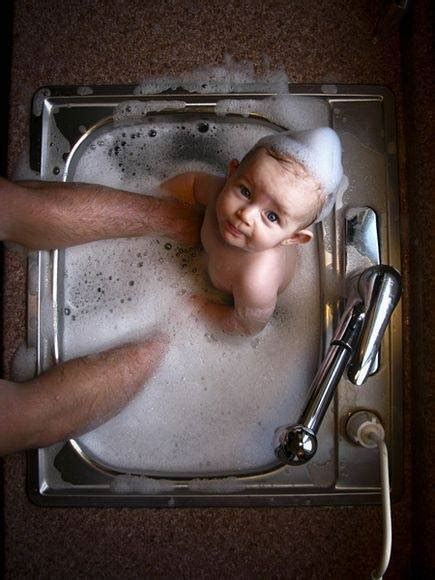 Bathing your baby while standing is a lot less stressful than squatting over the these are used as an addition to baby bathtubs. Why do some people bathe their babies in the kitchen sink ...