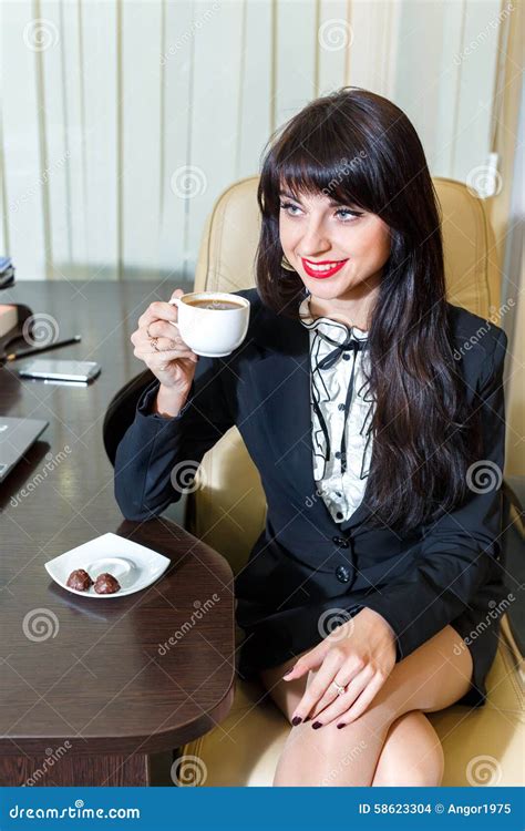 Attractive Woman Drinking Coffee In The Office Stock Photo Image Of