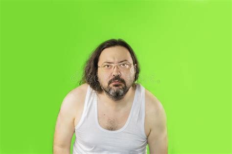 A Surprised Unshaven Man In A White Undershirt Stock Image Image Of Lazy Europe 260356697