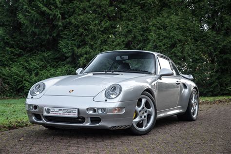 Here is a 1997 porsche 993 turbo, silver with black interior, with recaro seats, carbon fiber, turbo embroidery on back seats and turbo crest on front beverly hills car club. Porsche 993 Turbo S WLSII FOR SALE