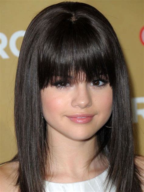 The Best And Worst Bangs For Round Face Shapes Selena Gomez Bangs