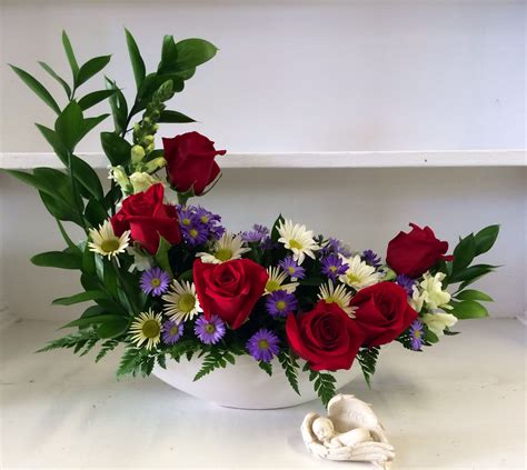 One Of Our Unique Crescent Arrangements Available At Edwards Flowerland Contemporary Flower