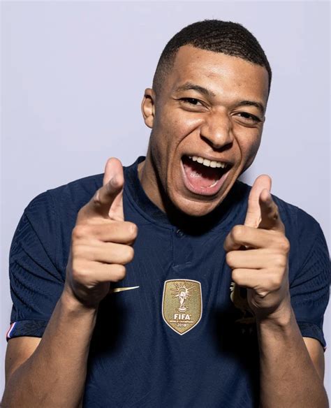 kylian mbappé gives it the double finger point a classic photograph michael regan fifa getty